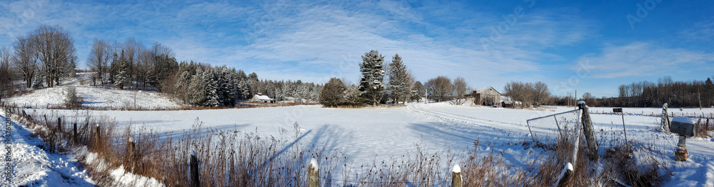 A winter countryside landscape with farm in the province of Quebec, Canada A winter countryside landscape with farm in the province of Quebec, Canada