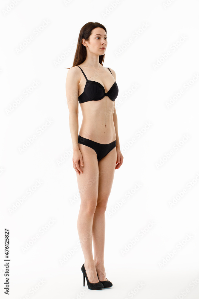 Model tests. Snap Models back view, Beautiful brunette woman in underwear, isolated on white. Model tests. Snap Models back view, Beautiful brunette woman in underwear, isolated on white.