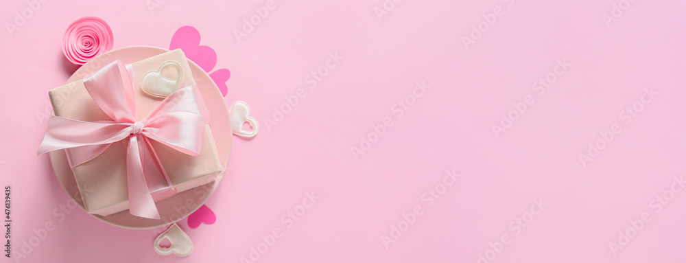 Present for Valentines Day on pink background with space for text Present for Valentines Day on pink background with space for text