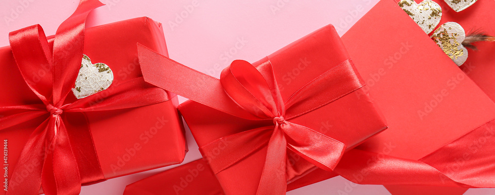 Gifts for Valentines Day and envelope on pink background Gifts for Valentines Day and envelope on pink background