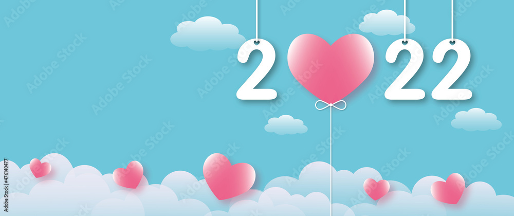 Many pink hearts with year 2022 on blue sky background. Greeting card for Valentine, Wedding, Mother's, Father's day, birthday, poster or postcard, love concept. copy space. paper art design style.
