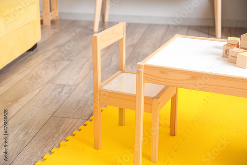 Interior of children s room with table and chair