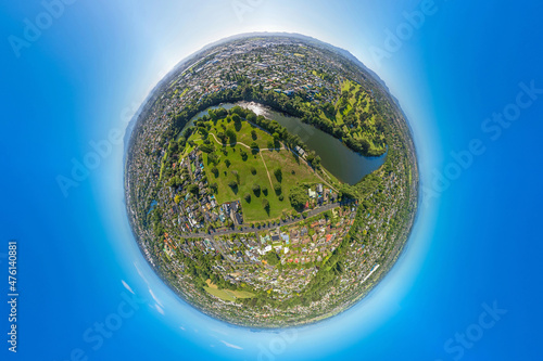 Aerial drone panoramic tiny planet globe view, captured from Days Park, looking over the city of Hamilton, in the Waikato region of New Zealand