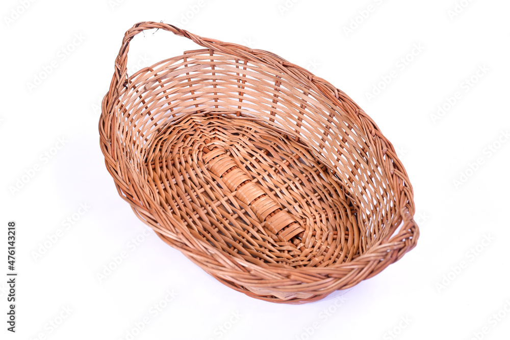 Obraz premium Empty wicker basket isolated on white background