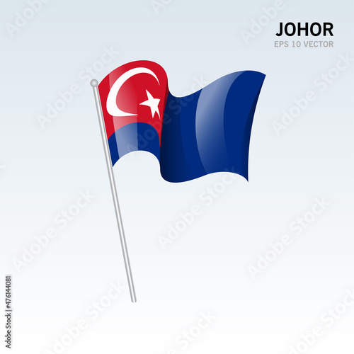 Waving flag of Johor state and federal territory of Malaysia isolated on gray background