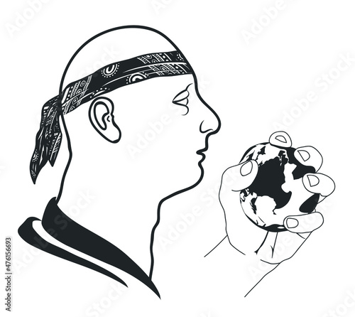 A bald man wearing a bandana holds the earth in his fist. Hand holding the world or the globe.