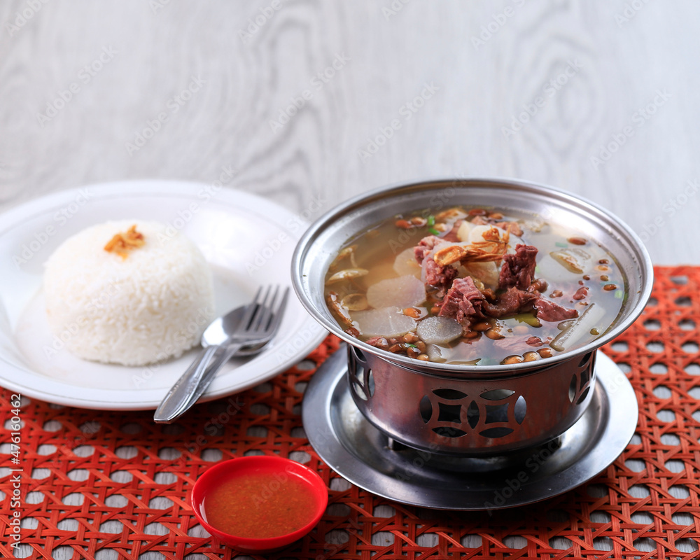 Restaurant Made Soto Bandung Delicious Clear Soup from West Java Indonesia, Served with WHite Rice Restaurant Made Soto Bandung Delicious Clear Soup from West Java Indonesia, Served with WHite Rice