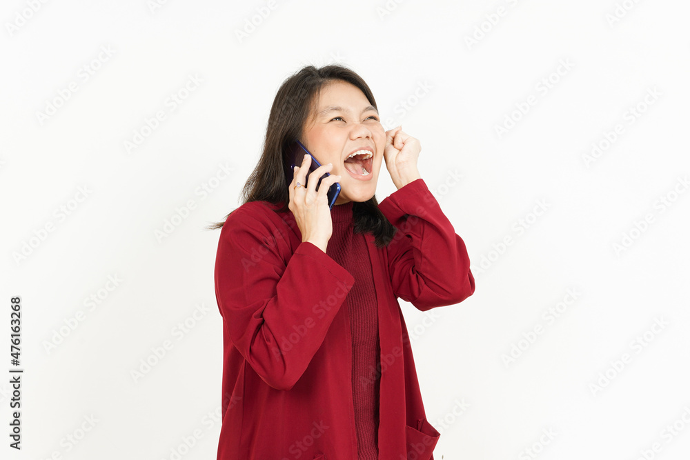 Talking on the Phone Of Beautiful Asian Woman Wearing Red Shirt Isolated On White Background Talking on the Phone Of Beautiful Asian Woman Wearing Red Shirt Isolated On White Background