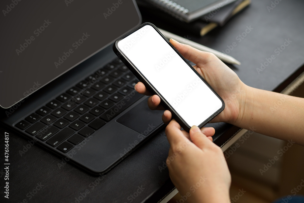 A woman browsing internet via smartphone. A woman browsing internet via smartphone.