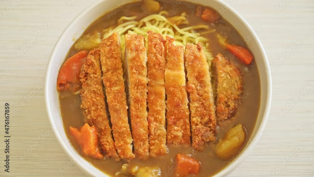 curry ramen noodles with tonkatsu fried pork cutlet - Japanese food style curry ramen noodles with tonkatsu fried pork cutlet - Japanese food style