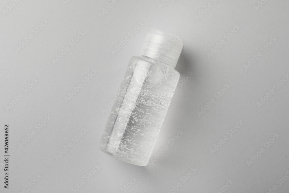 Bottle of cosmetic gel on white background, top view Bottle of cosmetic gel on white background, top view