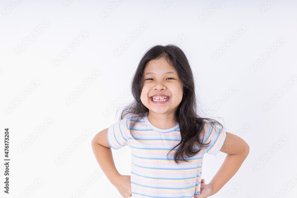 Asian kid girls are very cute smiles very happy, cheerful, bright, positive attitude, Photography standing in a studio with white background and copy space. Asian kid girls are very cute smiles very happy, cheerful, bright, positive attitude, Photography standing in a studio with white background and copy space.