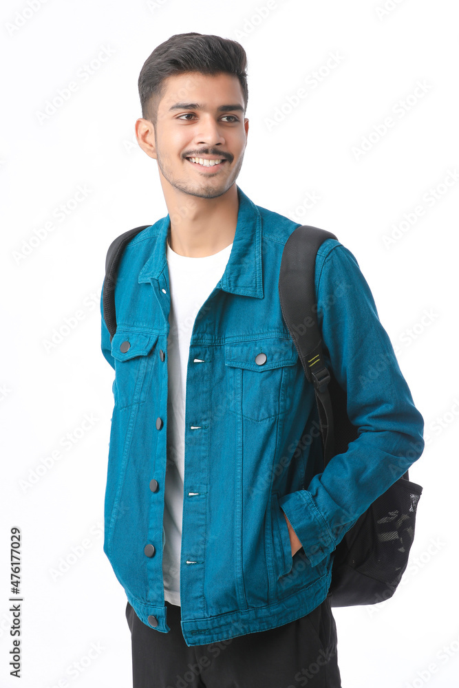 Young indian college student giving expression on white background. Young indian college student giving expression on white background.
