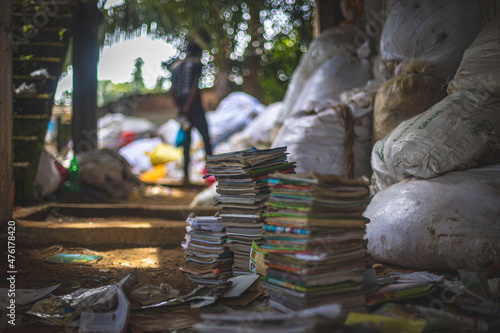 Old books waiting to be recycled in a recycling center in teknaf bangladesh