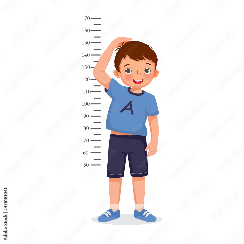 Cute Little boy measuring height of his growth on the background of wall - obrazy, fototapety, plakaty 