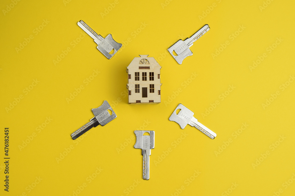 House keys and house model. Top view, flat lay.