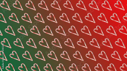 Christmas lollipops in the shape of a heart on a red-green background.