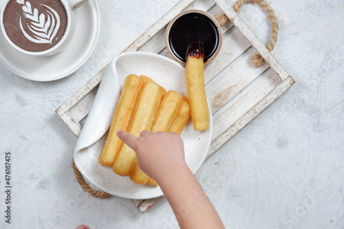 Churros,spanish traditional dessert and chocolate dipping photo