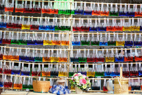 Colored water in plastic bags for a background