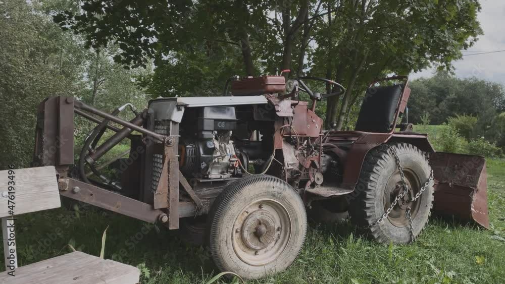 homemade tractor in the summer on the farm homemade tractor in the summer on the farm