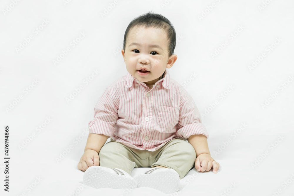 Stylish fashionable kid. Toddler baby boy model in casual clothes.Happy smiling Adorable asian
child in pink shirt sitting on white bedsheet.Fashion and Style. Stylish fashionable kid. Toddler baby boy model in casual clothes.Happy smiling Adorable asian
child in pink shirt sitting on white bedsheet.Fashion and Style.