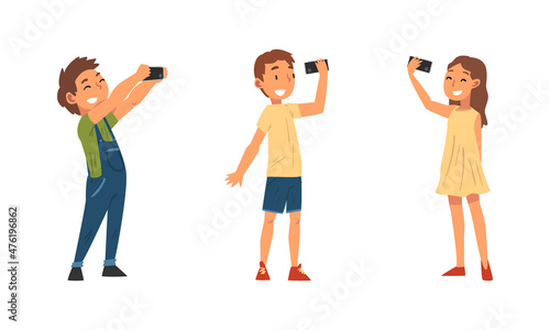 Little Kid Holding Smartphone Having Video Call or Taking Selfie for Social Media Vector Set