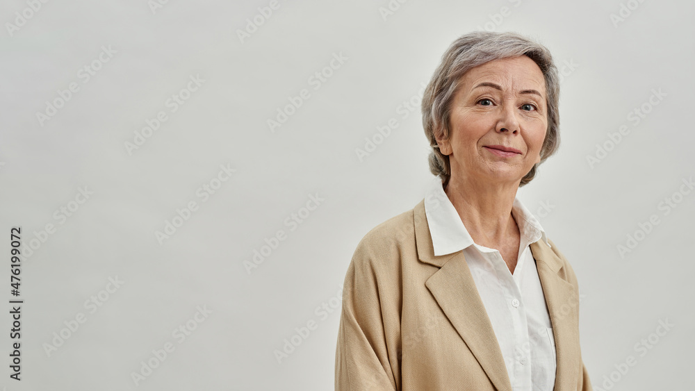 Portrait of elderly caucasian woman look at camera Portrait of elderly caucasian woman look at camera