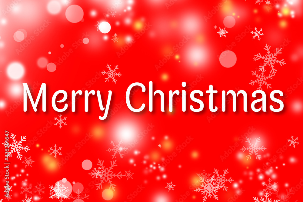 Merry Christmas text on red background. White Christmas text on red backdrop. White snow flakes and light bokeh.