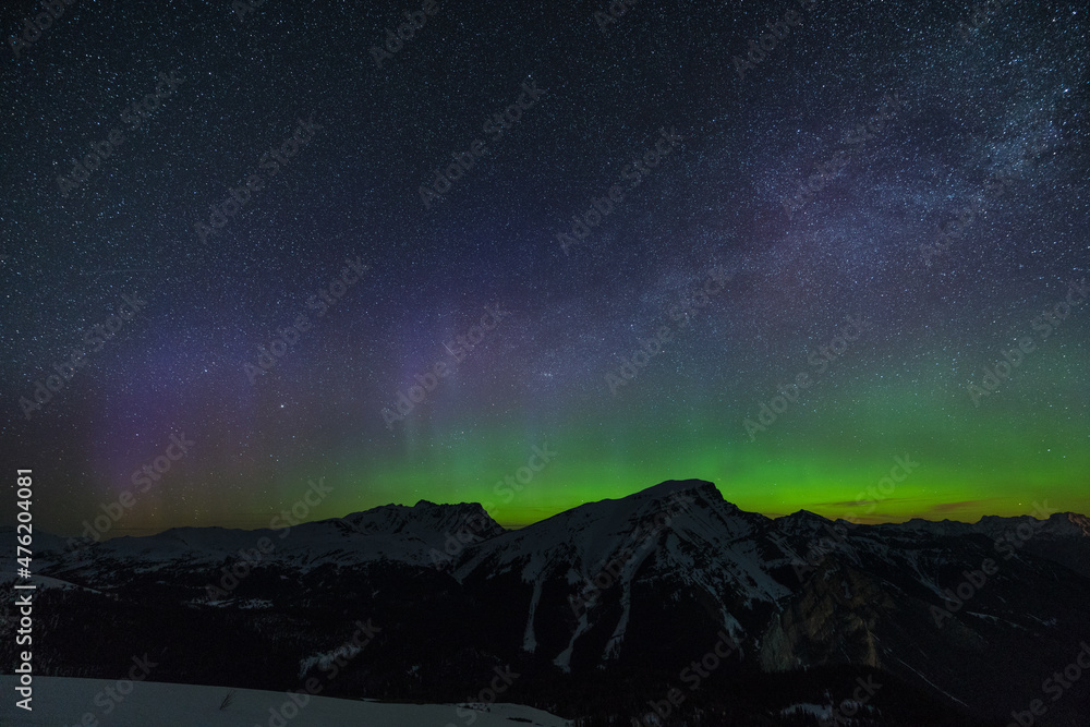 Beautiful green aurora dancing over Mt. Borgeau, Banff, Canada