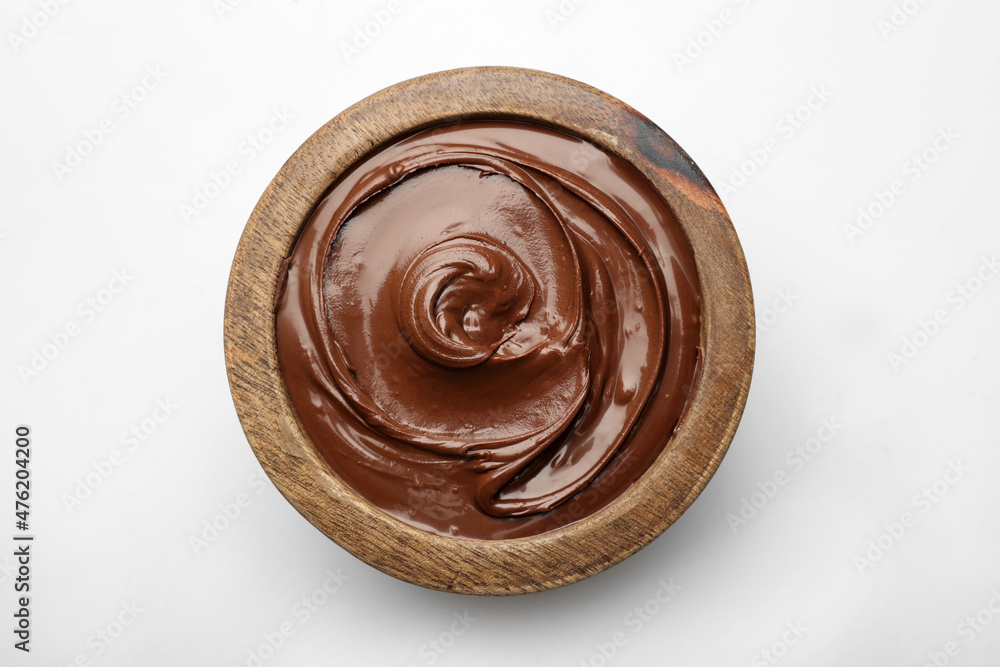 Bowl of tasty chocolate spread isolated on white, top view Bowl of tasty chocolate spread isolated on white, top view
