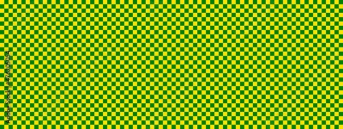 Checkerboard banner. Green and Yellow colors of checkerboard. Small squares, small cells. Chessboard, checkerboard texture. Squares pattern. Background.