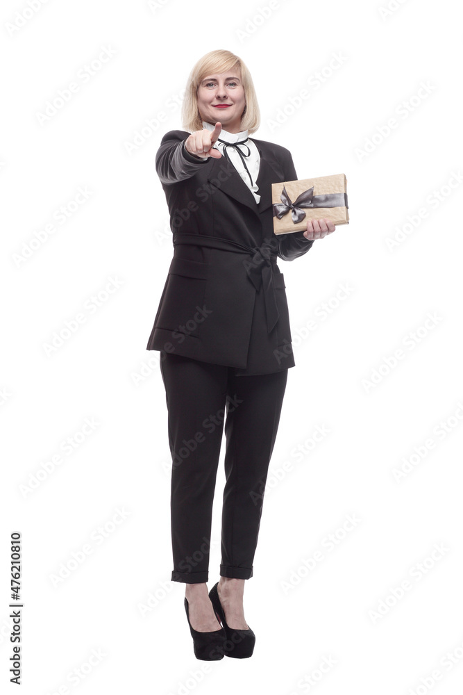 in full growth. attractive business woman with a gift box. in full growth. attractive business woman with a gift box.