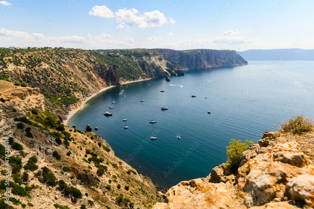 View of the sea bay with yachts from a high cliff. Black Sea, Crimea.