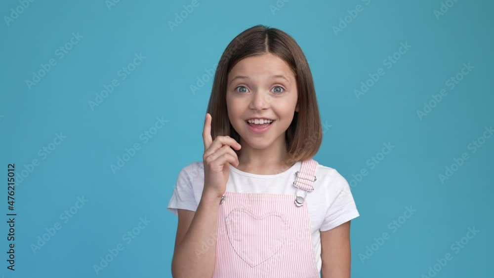 Stylish trendy schoolkid decide clever mind isolated blue color background Stylish trendy schoolkid decide clever mind isolated blue color background