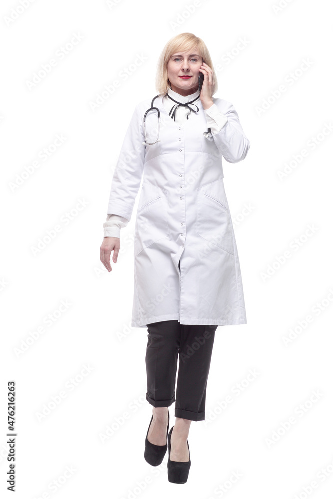 qualified female doctor with a smartphone in her hands. qualified female doctor with a smartphone in her hands.