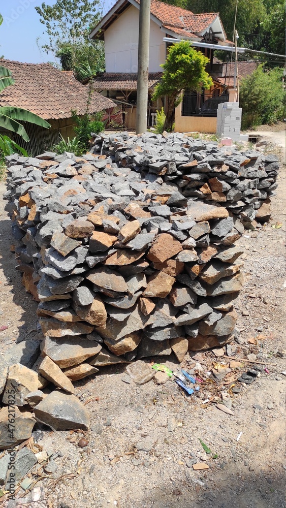 Background photo of a pile of flat stones in the Cikancung area, Indonesia Background photo of a pile of flat stones in the Cikancung area, Indonesia