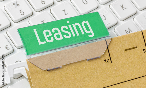 A brown file folder labeled Leasing