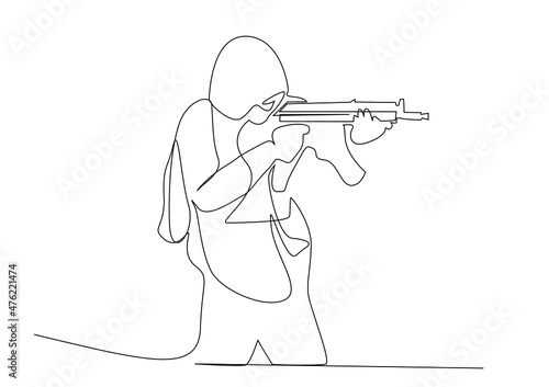 man in gas mask with gun. armed terrorist