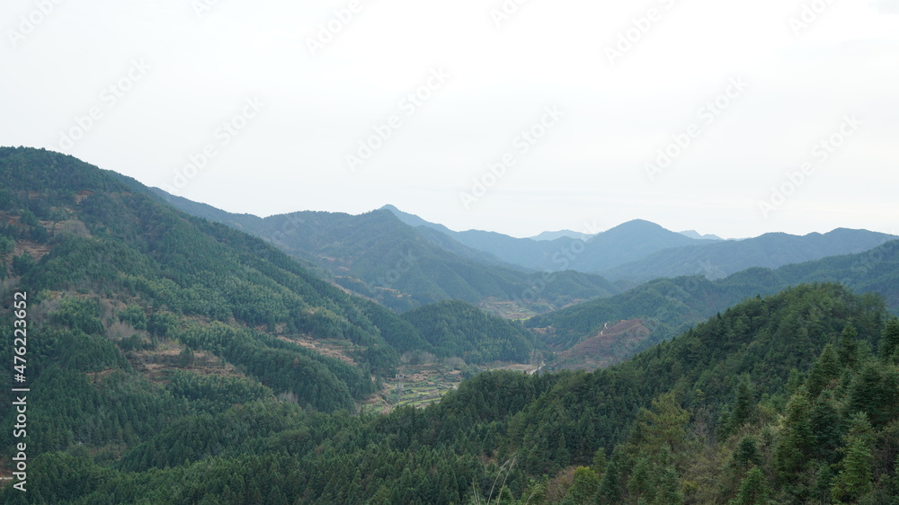 The beautiful mountains view with the fresh green forest in the countryside of the southern China The beautiful mountains view with the fresh green forest in the countryside of the southern China