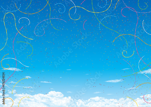 青空に舞うテープと紙吹雪　セレモニーのイメージ