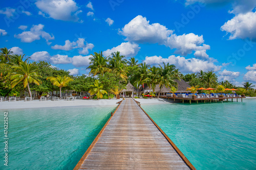 Amazing panorama landscape of Maldives beach. Tropical beach landscape seascape  luxury water villa resort wooden jetty. Luxurious travel destination background for summer holiday and vacation concept