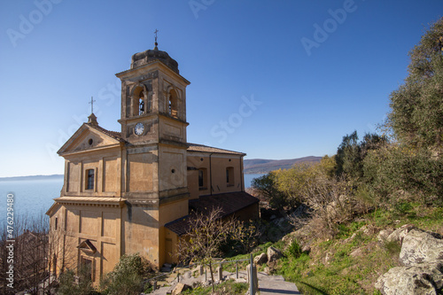 Church of the Assumption of Mary in panoramic views ,built around 1500 with The square bell tower.Trevignano Romano,Italy