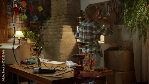 Wallpaper Mural Mature woman carpenter working in a small workshop Torontodigital.ca