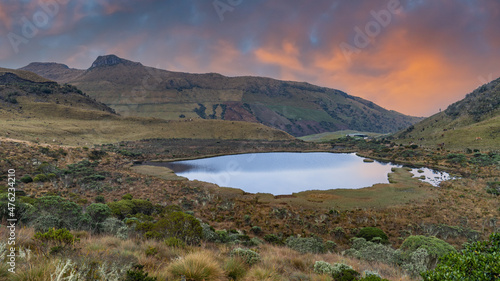 The majestic black lagoon in the snowy park where the Nevado del Ruiz, Nevado del Tolima and the Nevado Santa Isabel are located