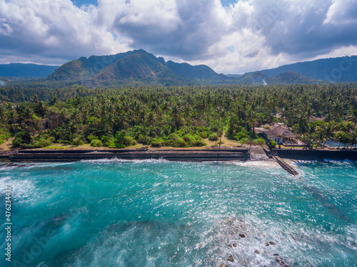 An aerial panoramic view on Candi Dasa shoreline on Bali island in Indonesia	
 photo