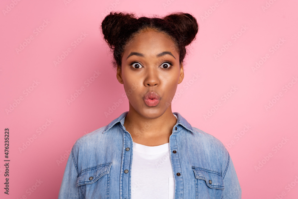 Photo of young lovely african lady pouted lips send air kiss flirty romantic isolated over pink color background Photo of young lovely african lady pouted lips send air kiss flirty romantic isolated over pink color background