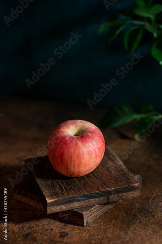 Fresh apples on the  wooden table