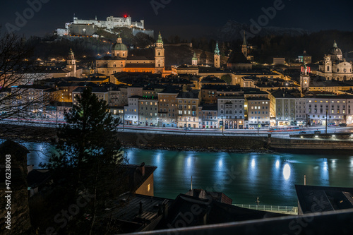salzburg city at night with fortress and town center