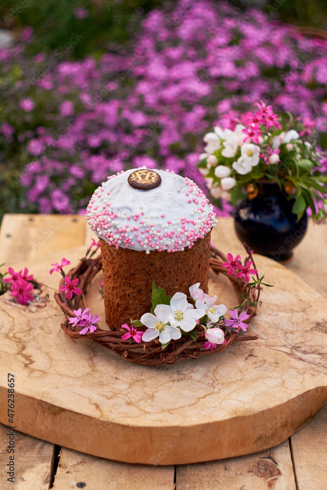 Easter cake with flowers. Side view. Easter cake with flowers. Side view.