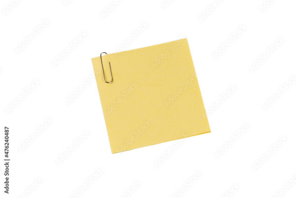 A sticker and a paper clip isolated on a white background A sticker and a paper clip isolated on a white background